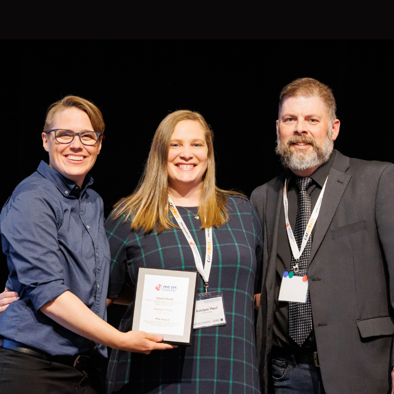 Katelynn receiving the award at the 2023 PHE National Conference