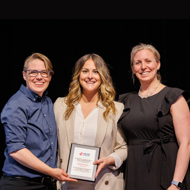 Stefanie receiving the award at the 2023 PHE National Conference