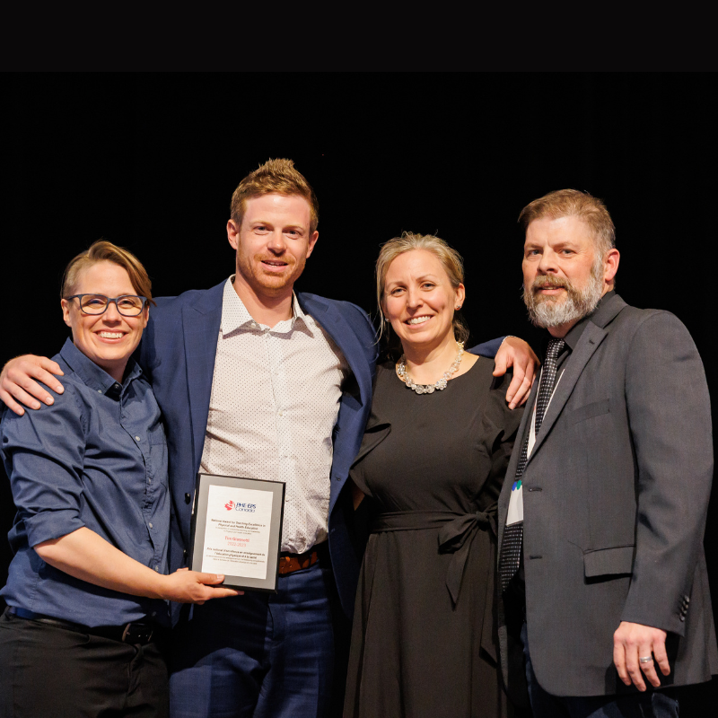 Tim receiving the award at the 2023 PHE National Conference