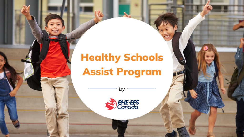 The image shows a group of children leaving school, jumping up and down and smiling. A centered white round circle has text inside that reads "PHE Canada Healthy Schools Program".