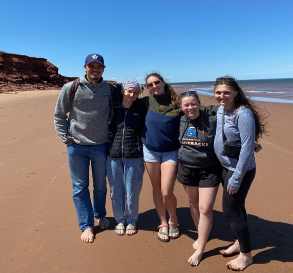 5 Ontario Tech Student Chapter Executives at Thundercove Beach in PEI
