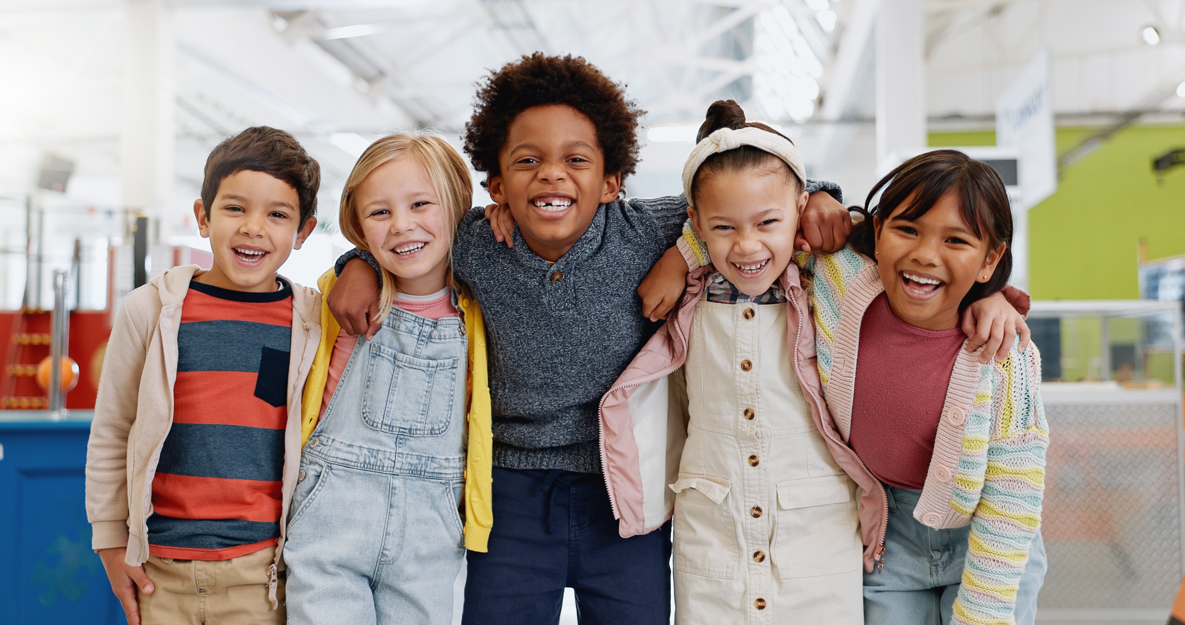 A group of children with happiness shown on their face.