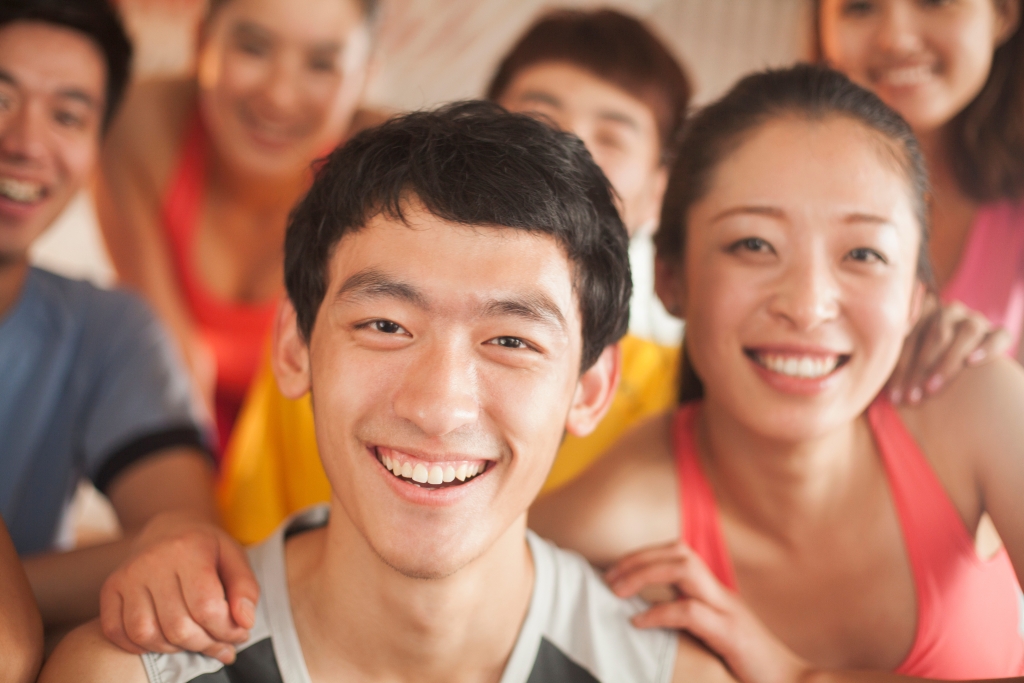 people smiling in the gym after exercising