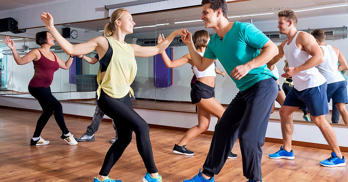 adults dancing in a dance studio in partners