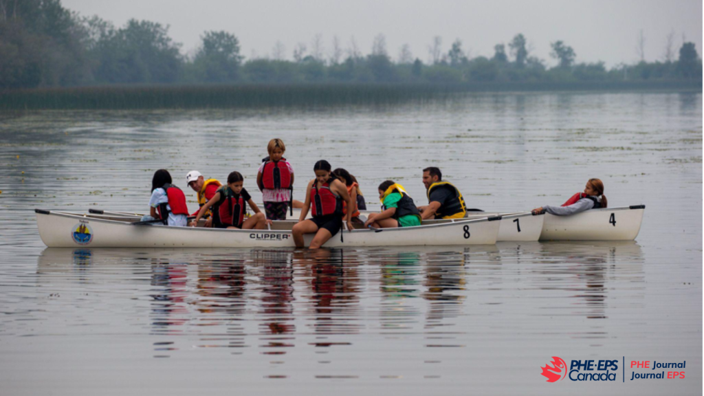 The photo shows a group of students are on canoes and learning.