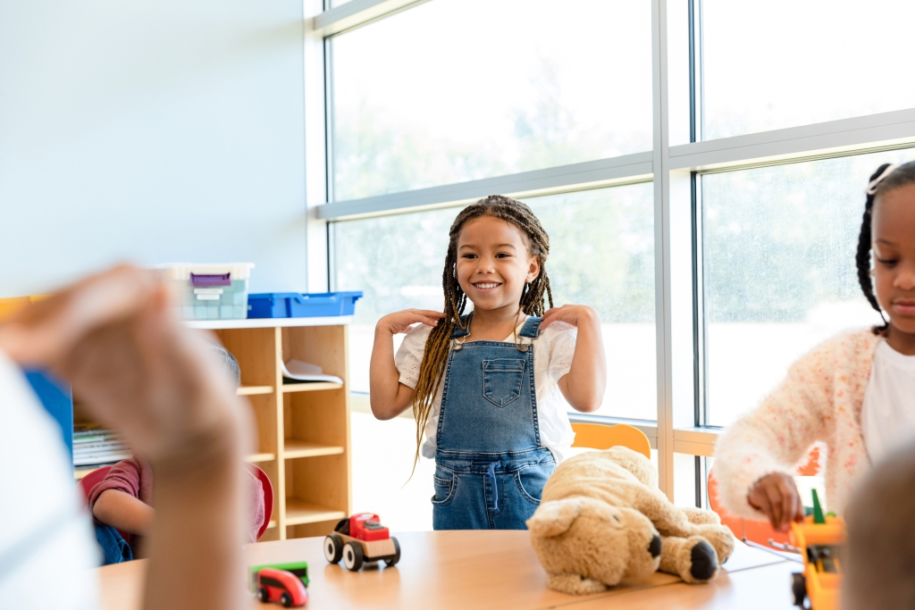 sbrn-girl-standing-classroom.jpg