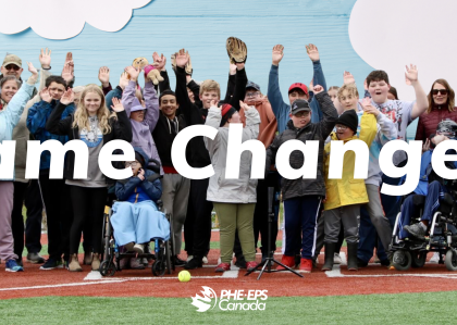 A group photo of the Game Changer workshop with the text "game changers" overlayed on top.